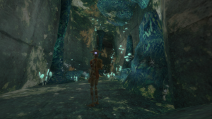 The rusty robot-like player character is looking at a blue colored grotto. Blue glowing mushrooms are visible.