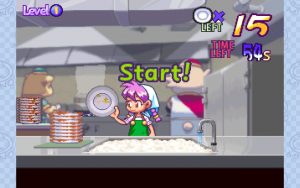 A girl is washing dishes at a restaurant.