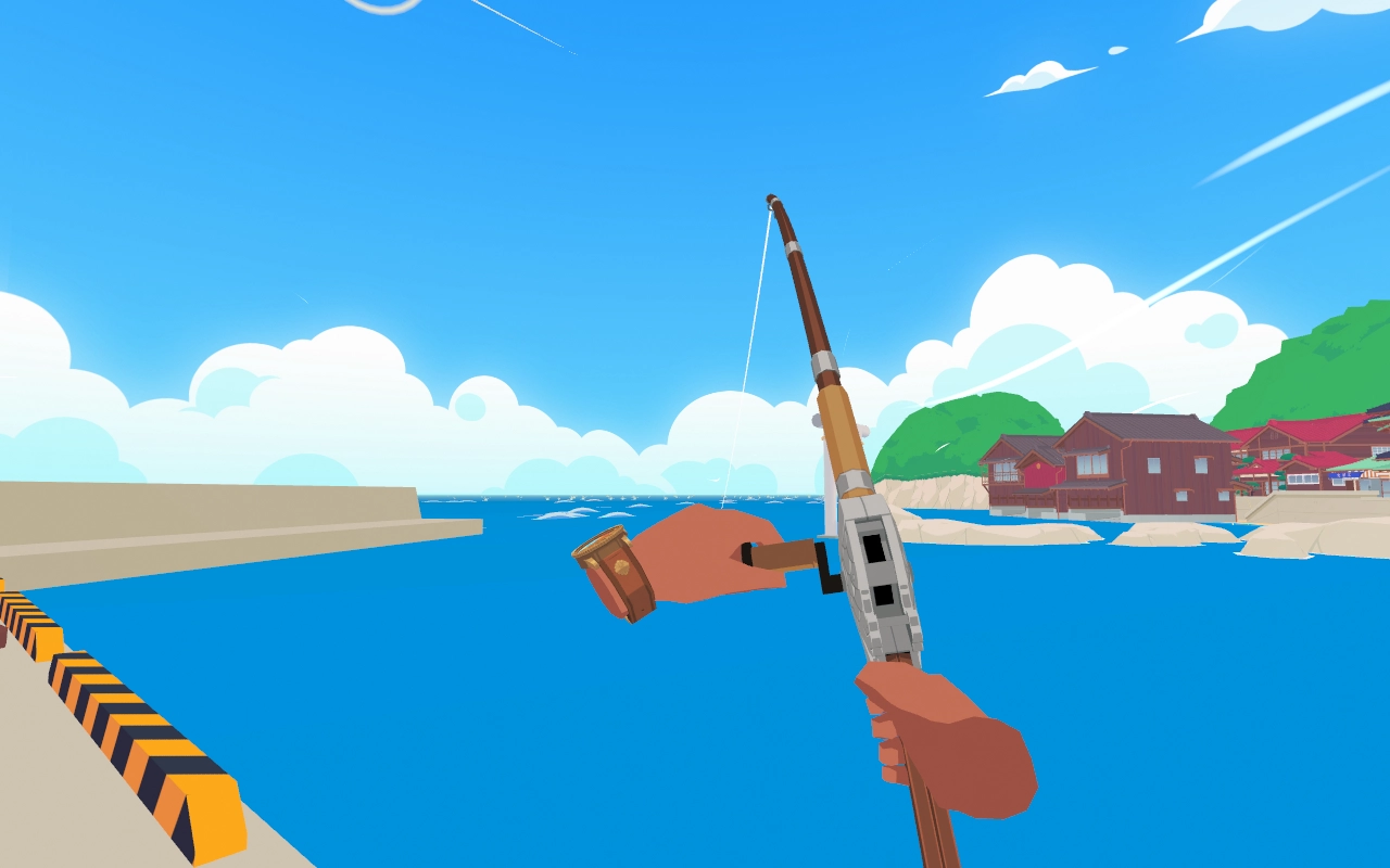 A fishing rod is held over a coast.