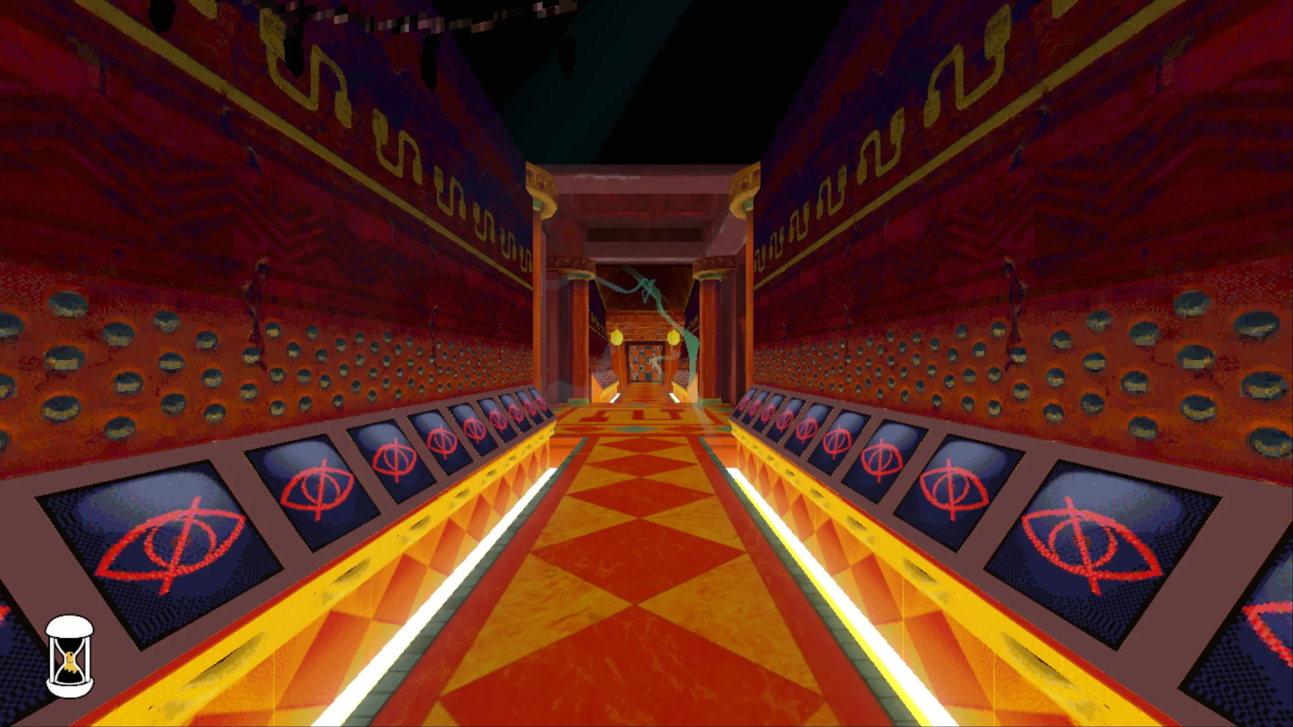 A hallway with monitors by the side.