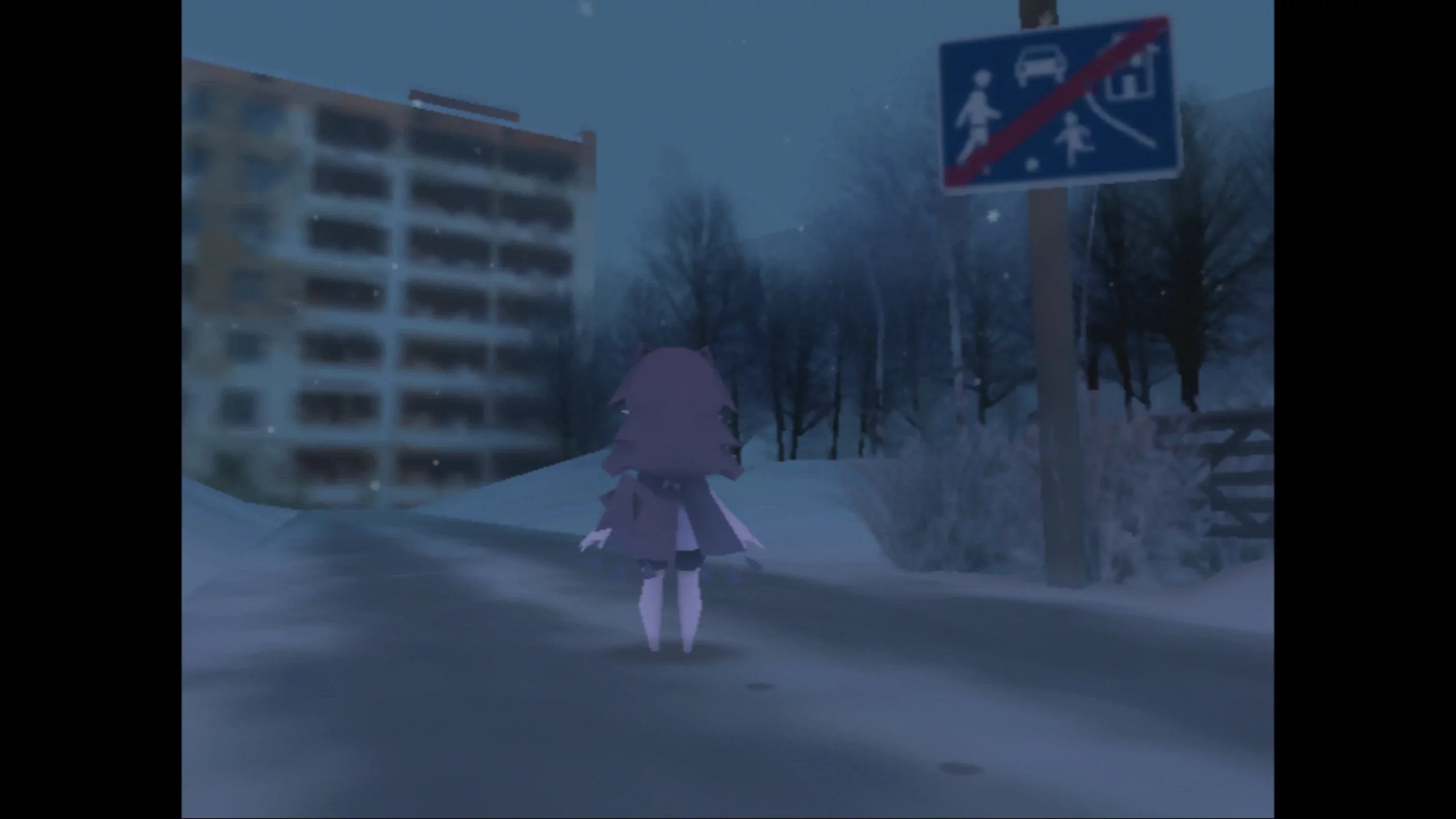 A girl standing in a snowy area, looking at a tall apartment block.
