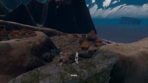 Two people walking across a stone wall, looking down at the area. 