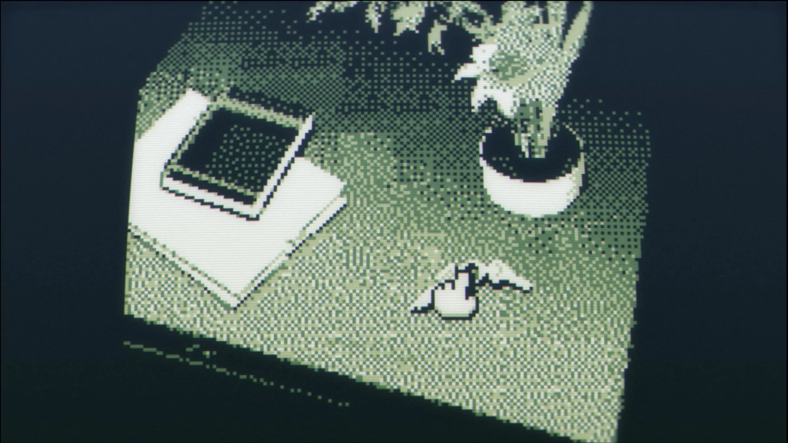 A table showing a notebook, plant and keys.