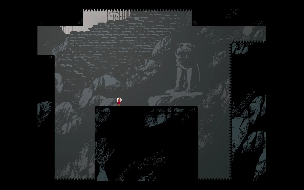 A platforming section within a dark cave.