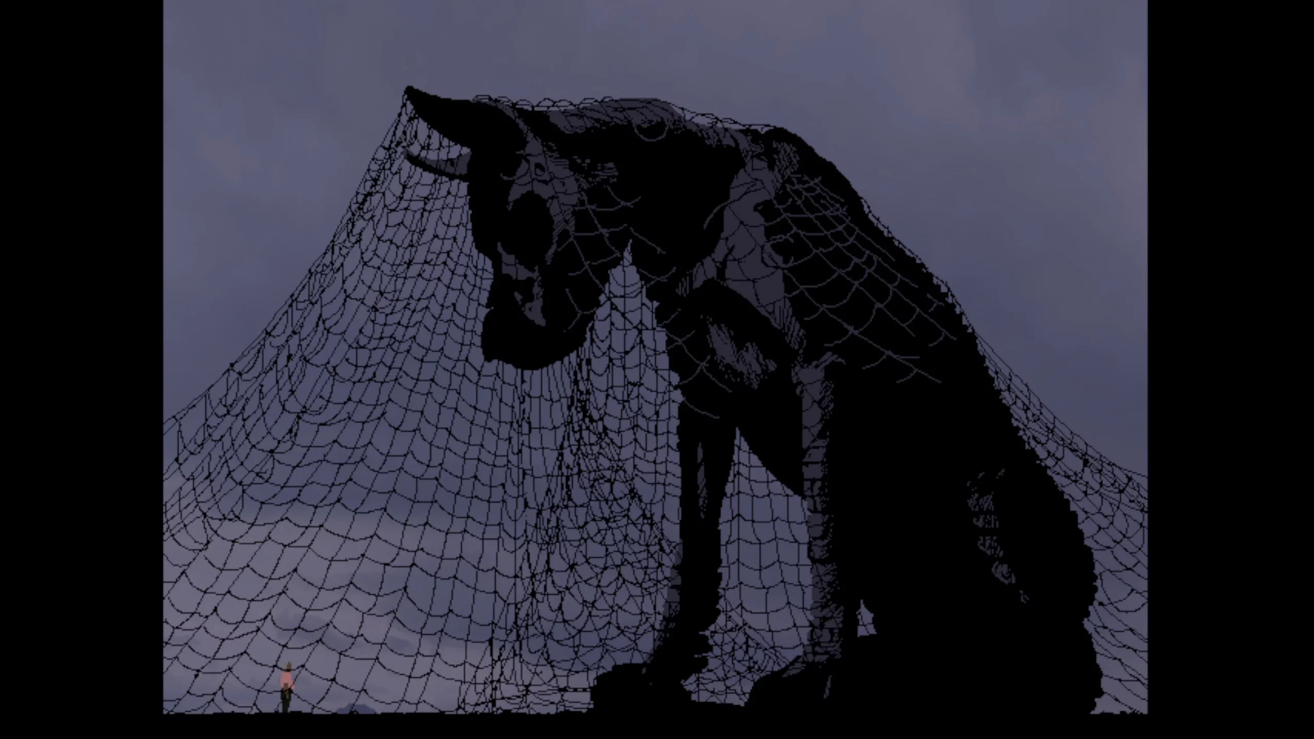 A huge dog statue towers above a man. 